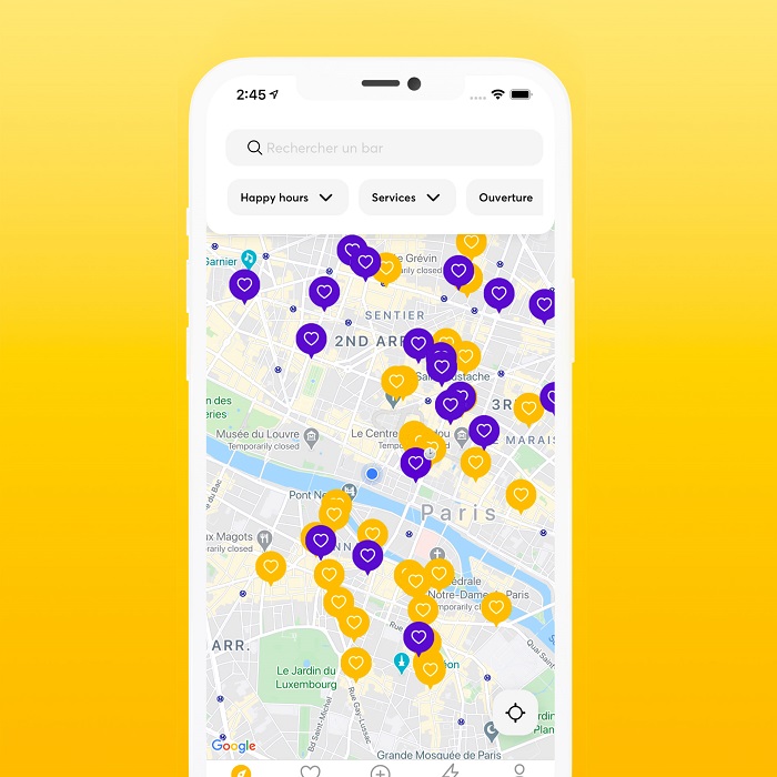 La Map sur l'application Schlouck Map est présentée sur un téléphone blanc sur fond jaune