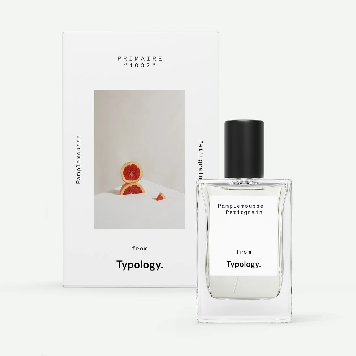 Parfum Typologie Pamplemousse et Petitgrain avec son emballage, arrière fond blanc